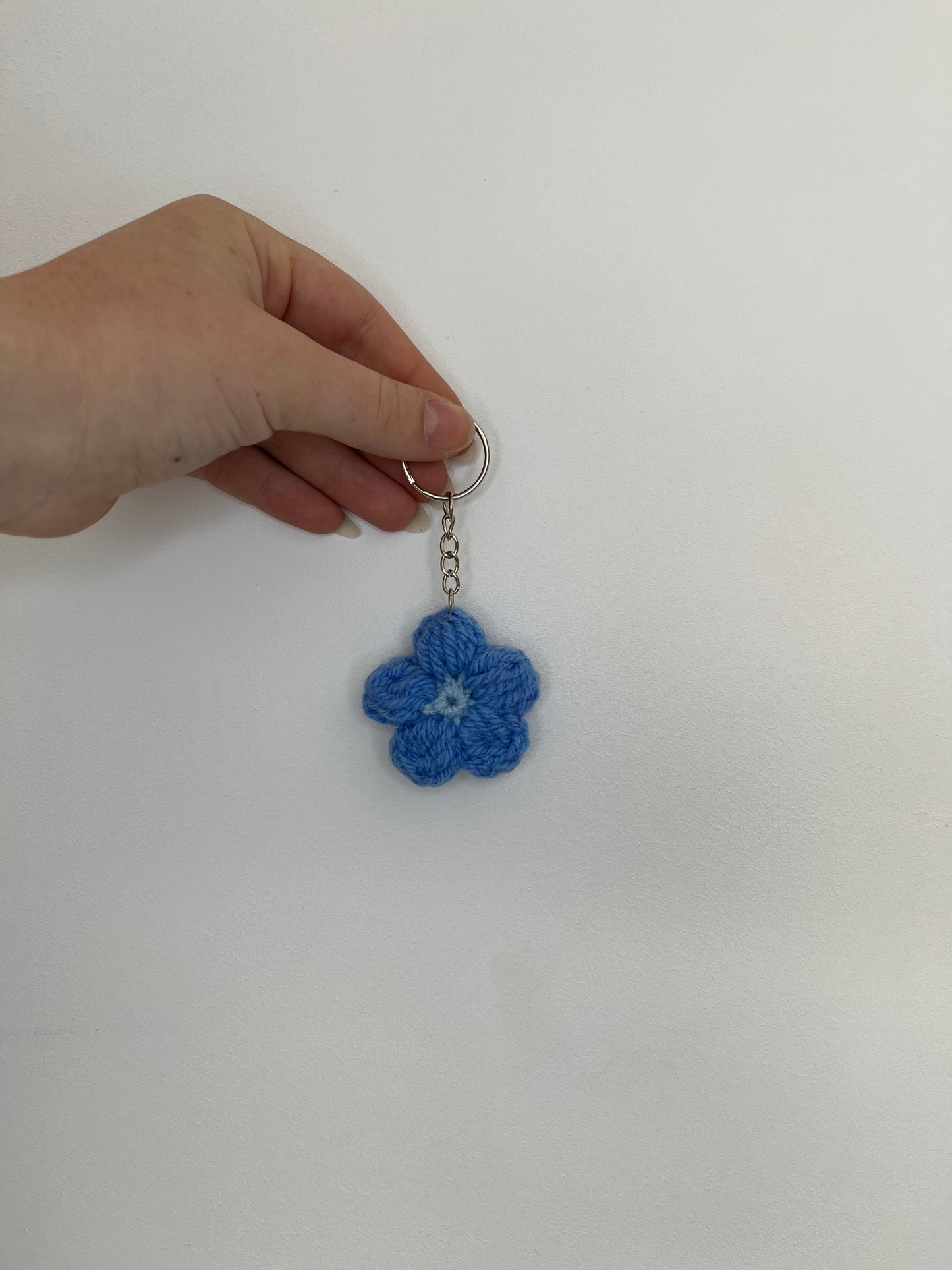 Porte-clé marguerite bleu foncé