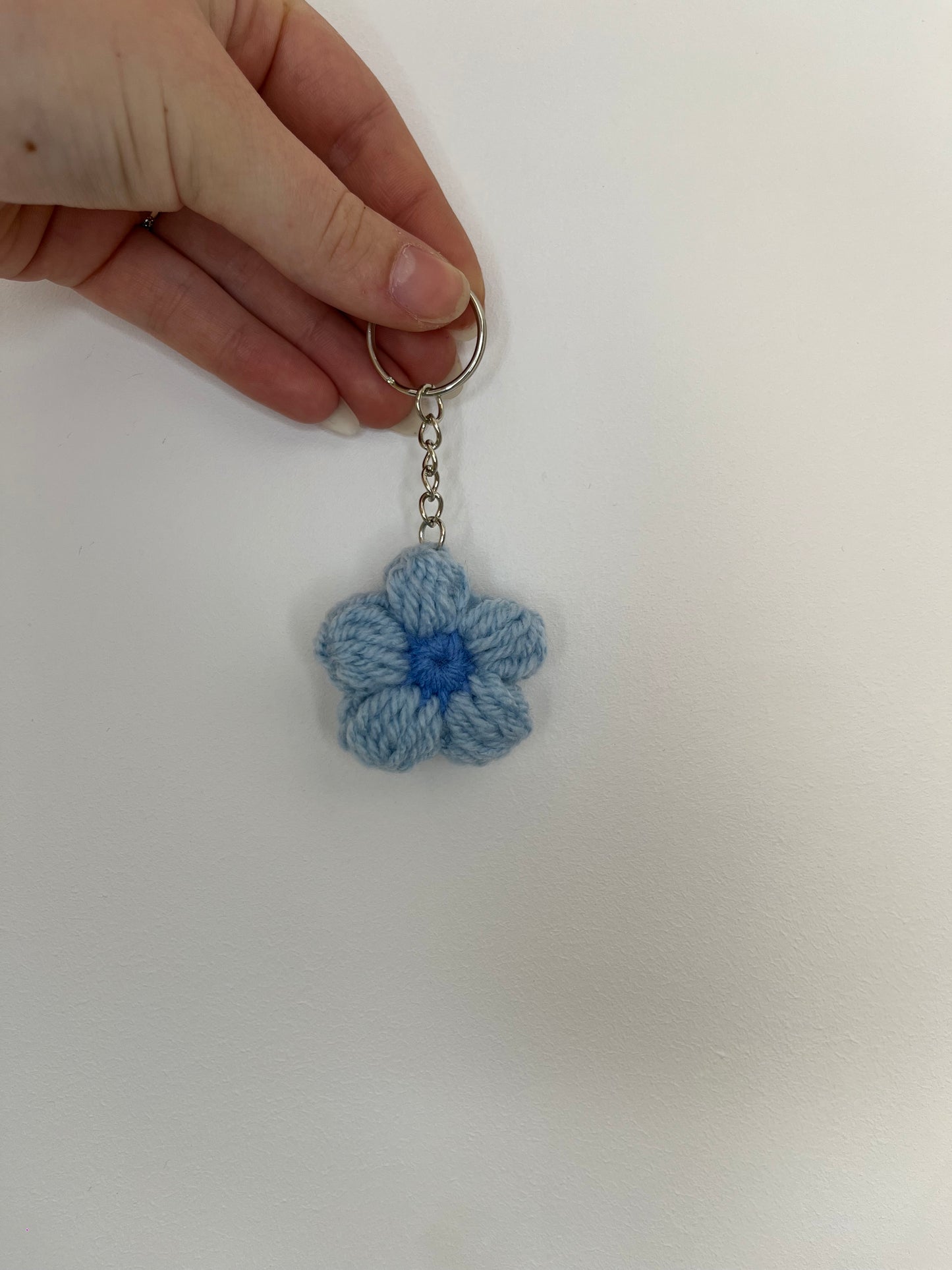 Porte-clé marguerite bleu clair